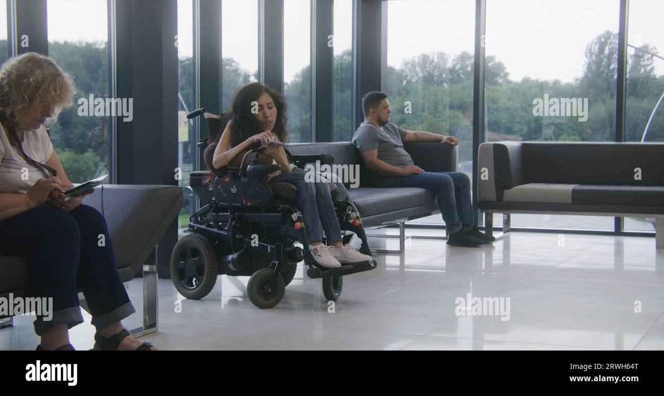 Wait Programme Diability Diverse patient hospital waiting area hi-res stock photography and ...