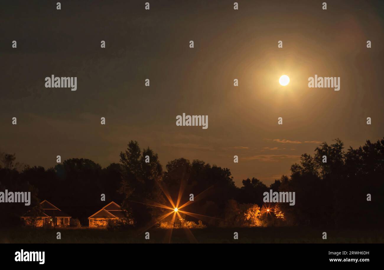Moon over houses trees architecture hi-res stock photography and images ...