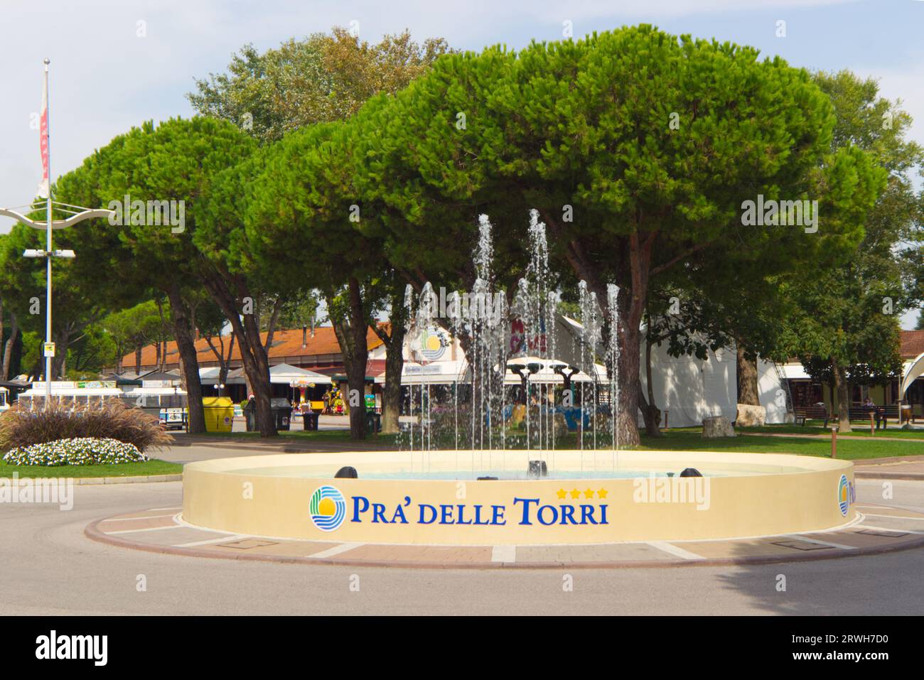 Duna Verde, Veneto, Italy - 09-12-2023: Pra' Delle Torri camping vacation center fountain with the logo. Stock Photo