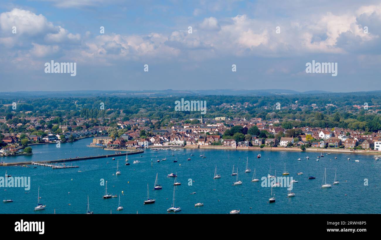 High Angle view of Emsworth waterfront and town. Late summers day with people walking the mill pond promenade. Stock Photo