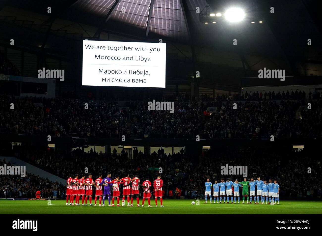 Manchester City and Red Star Belgrade players during a minute silence for the lives lost in the Morocco and Libya disasters prior to kick-off in the UEFA Champions League Group G match at the Etihad Stadium, Manchester. Picture date: Tuesday September 19, 2023. Stock Photo