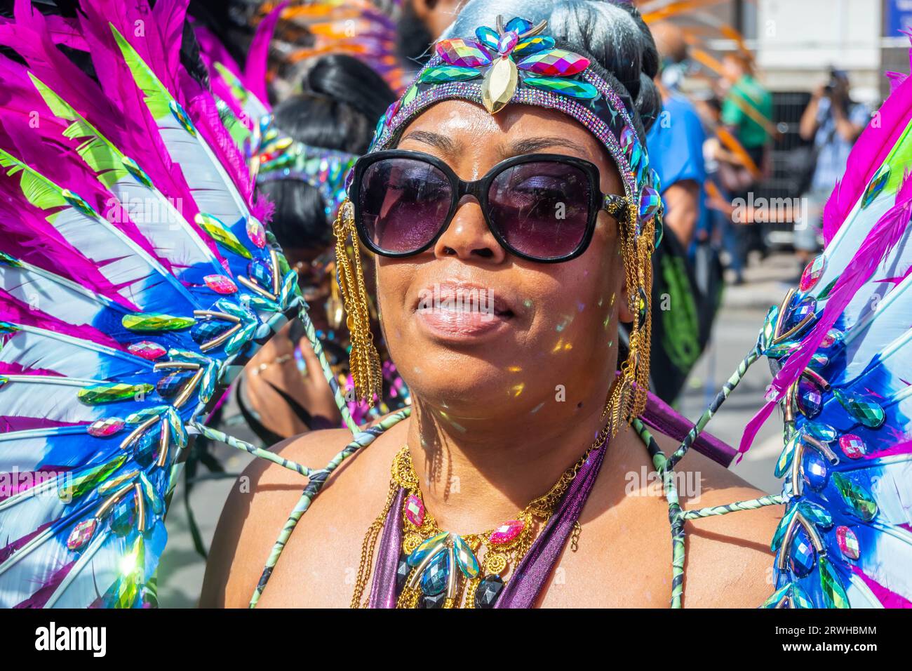 NOTTING HILL, LONDON, ENGLAND - 28 August 2023: Woman wearing a costume at Notting Hill Carnival 2023 Stock Photo