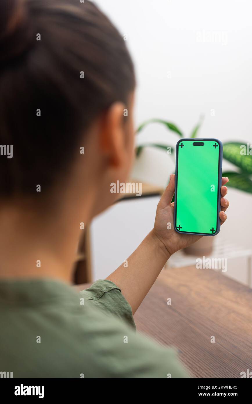smartphone with chroma key technology, woman virtual doctor visit, connecting healthcare provider  Stock Photo