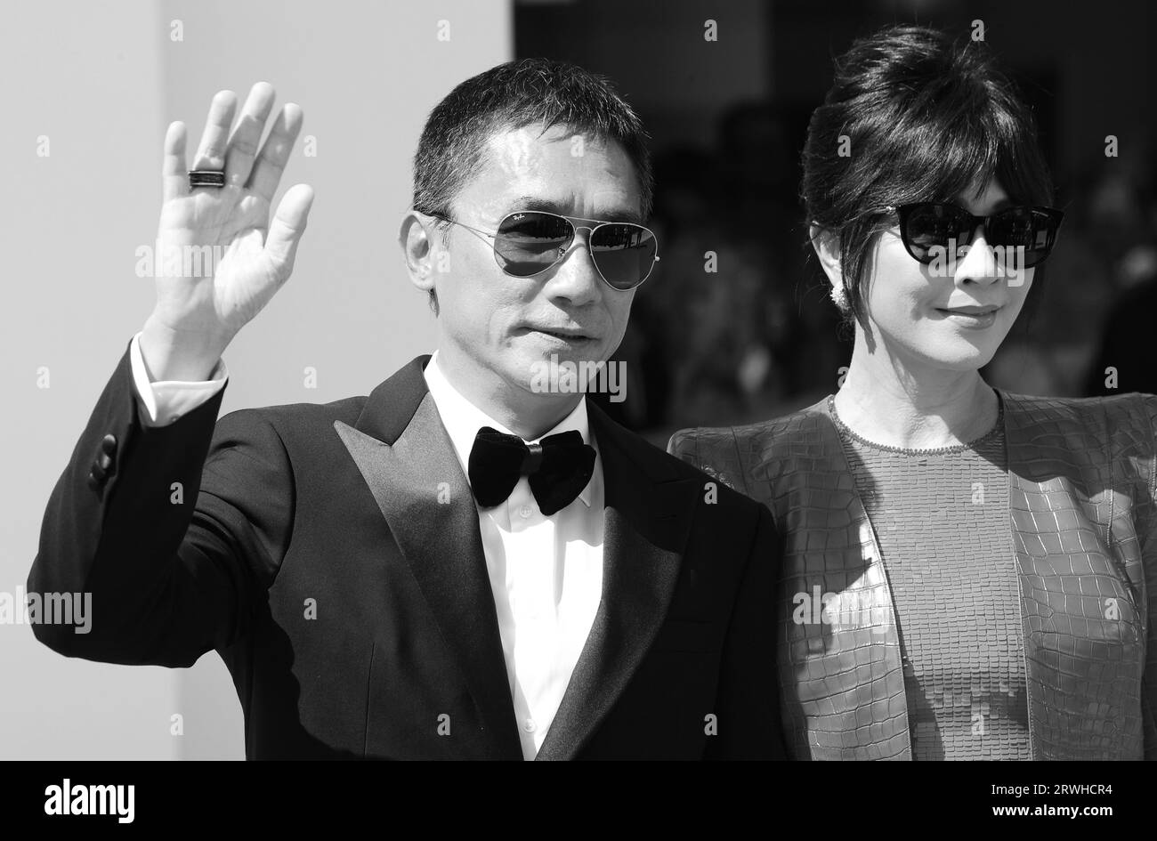 VENICE, ITALY - SEPTEMBER 02: Tony Leung Chiu-Wai and Carina Lau Kar-ling attends a red carpet for the Golden Lion For Lifetime Achievement Stock Photo