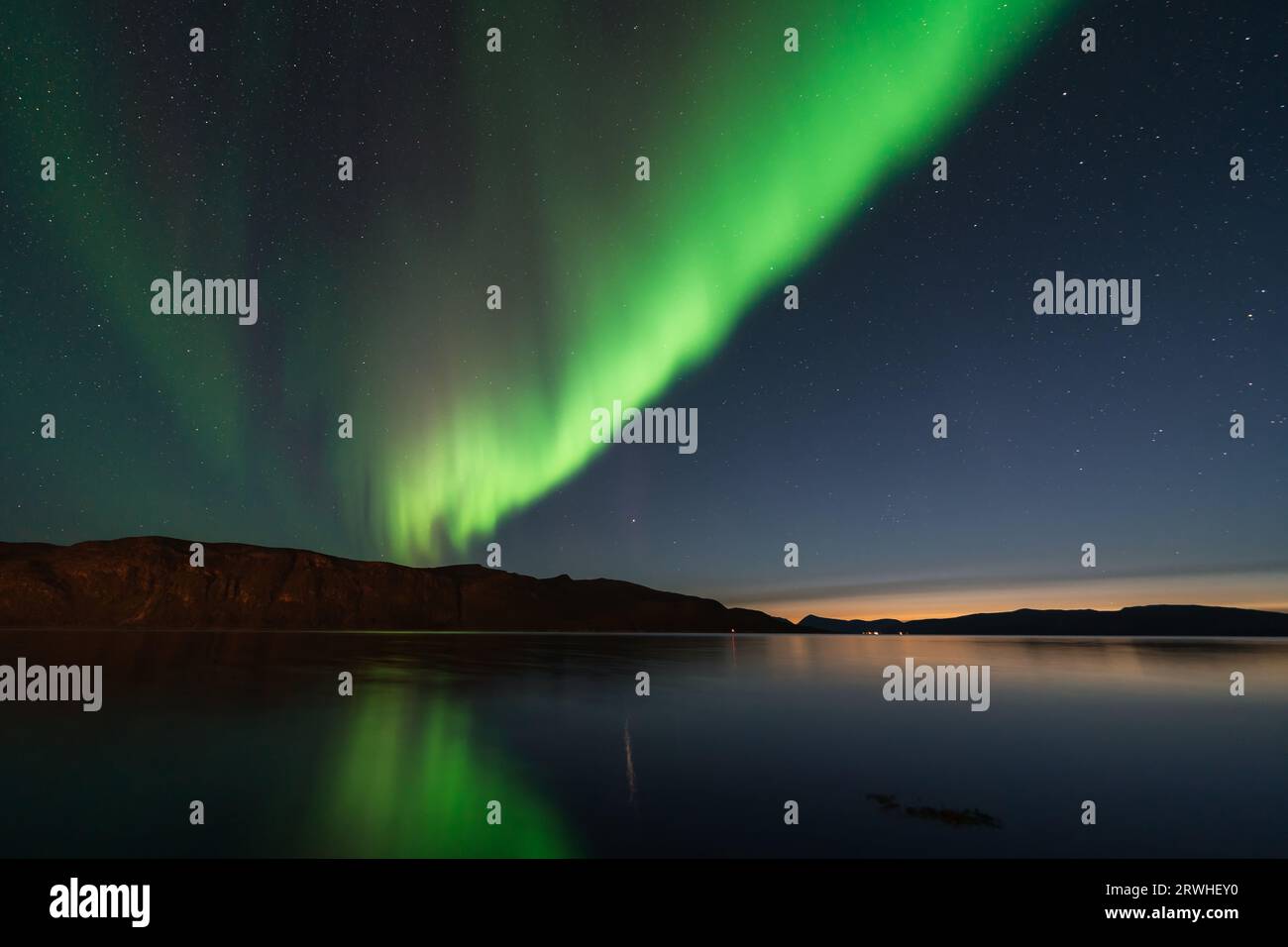 Northern Lights also known as Aurora Borealis over Scandinavia in Northern Norway Stock Photo