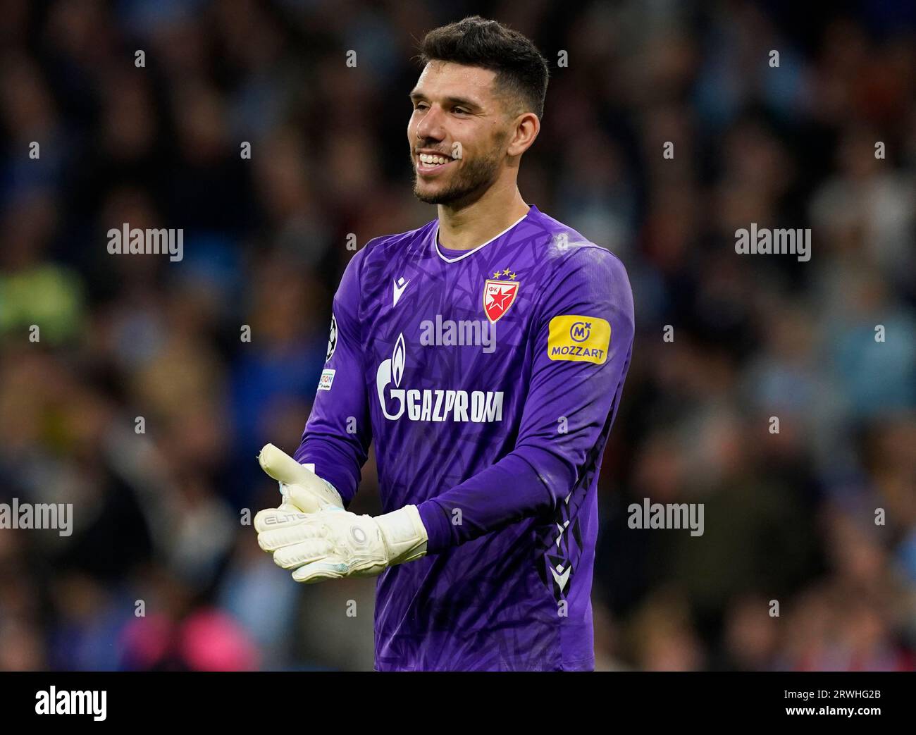 MANCHESTER, UK. 19th Sep, 2023. Omri Glazer of Red Star Belgrade smiles as he watches the goal celebrationsduring the UEFA Champions League match at the Etihad Stadium, Manchester. Picture credit should read: Andrew Yates/Sportimage Credit: Sportimage Ltd/Alamy Live News Stock Photo
