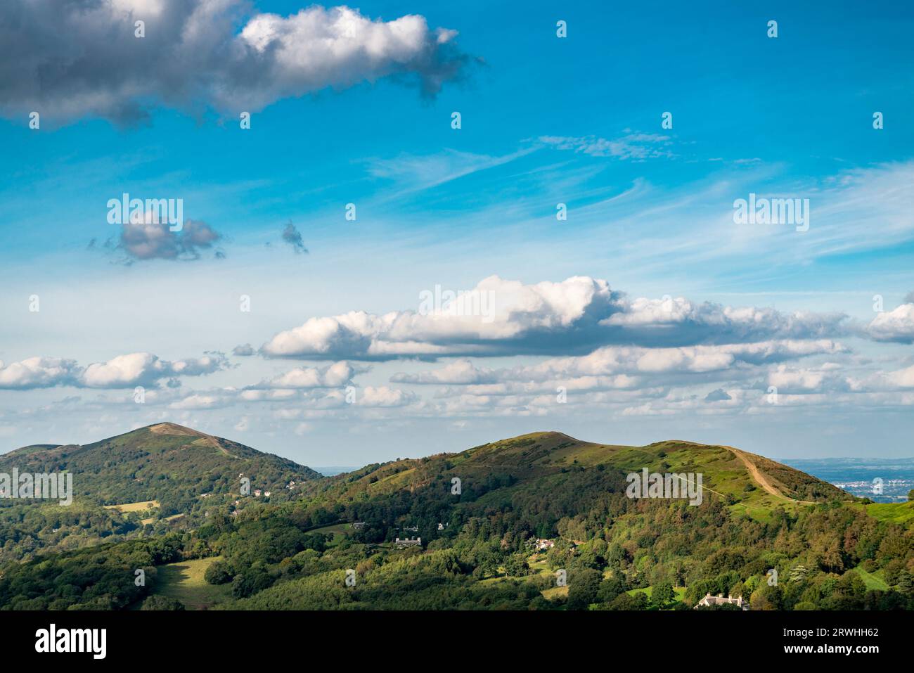 Herefordshire Beacon looking northwards,down towards the Malverns hill range,from the summit of the Iron Age hill fort,on a fine summertime afternoon, Stock Photo