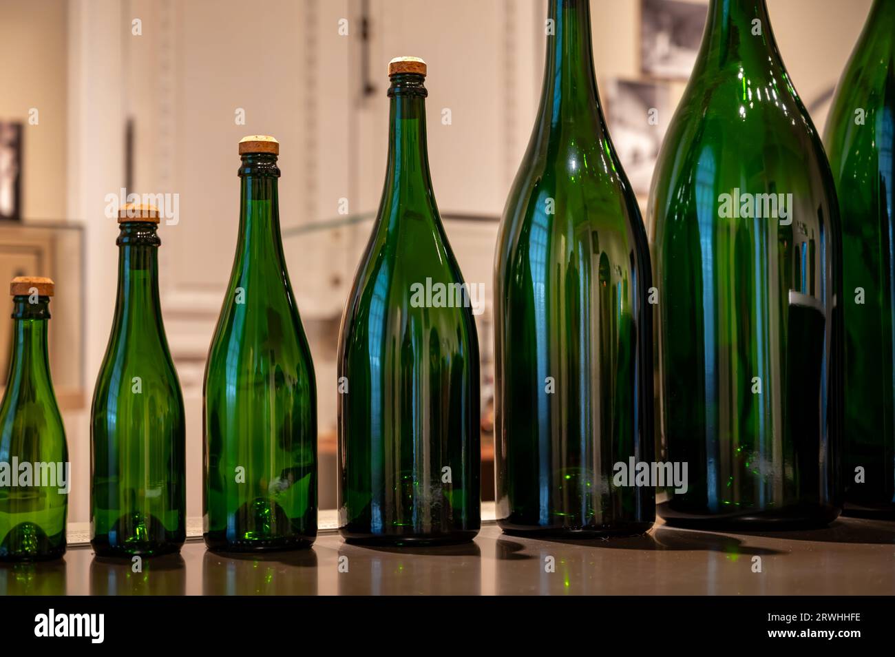 Different sizes of champagne bottles, traditional making champagne