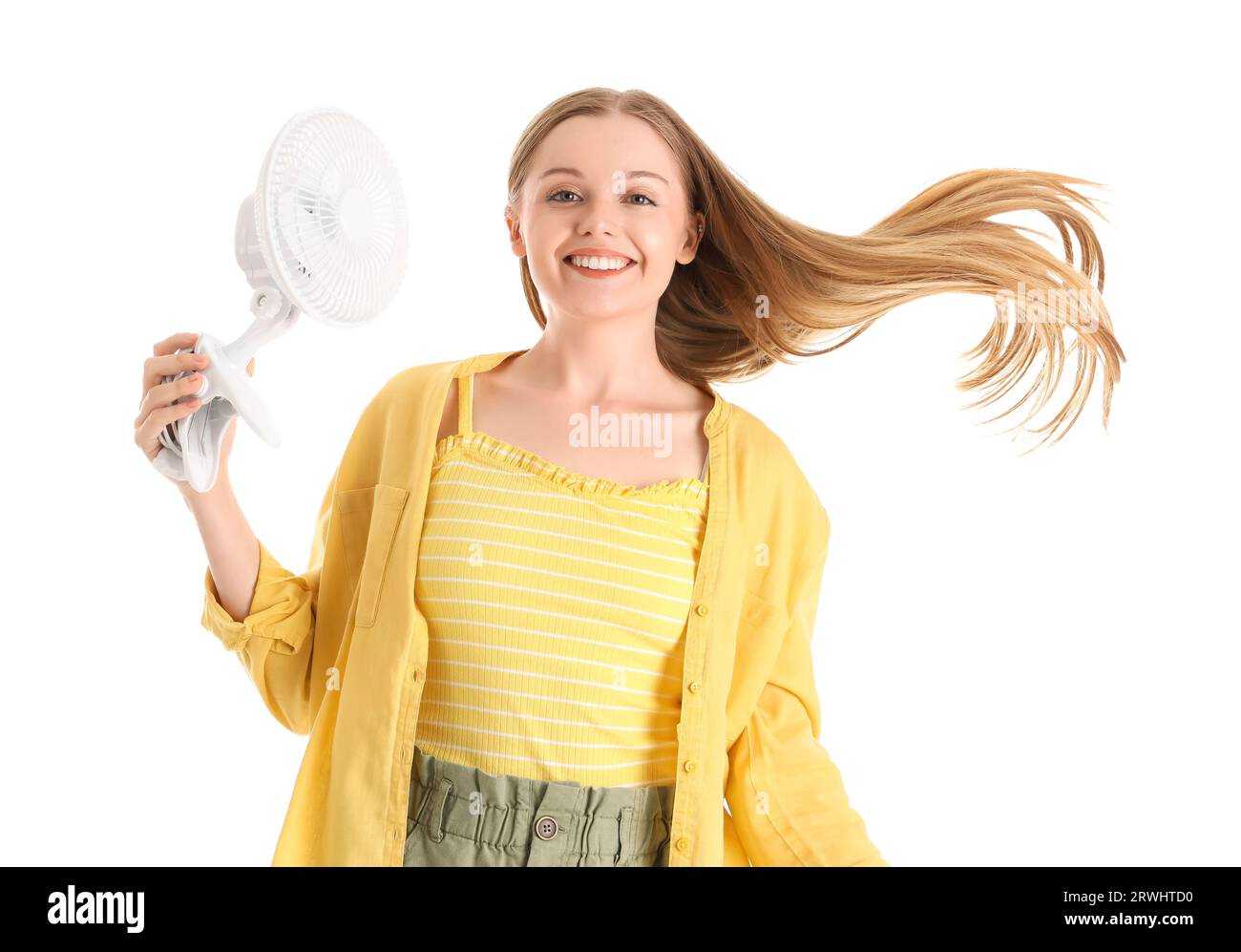 Young woman with electric fan on white background Stock Photo - Alamy