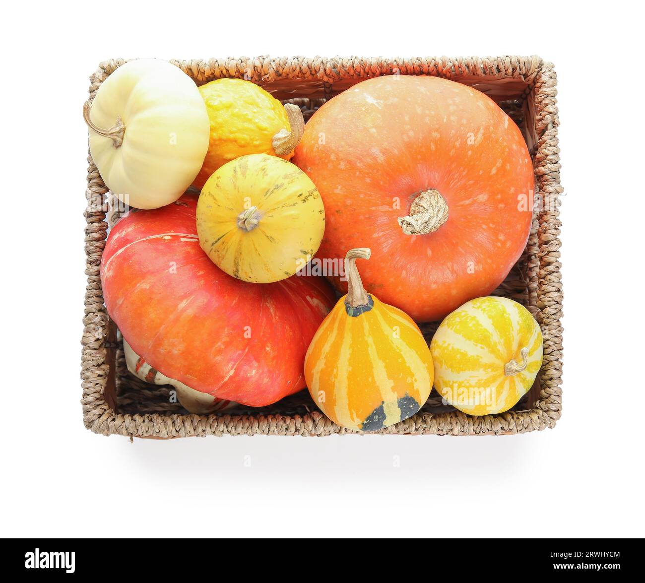 Wicker box with different fresh pumpkins on white background Stock ...