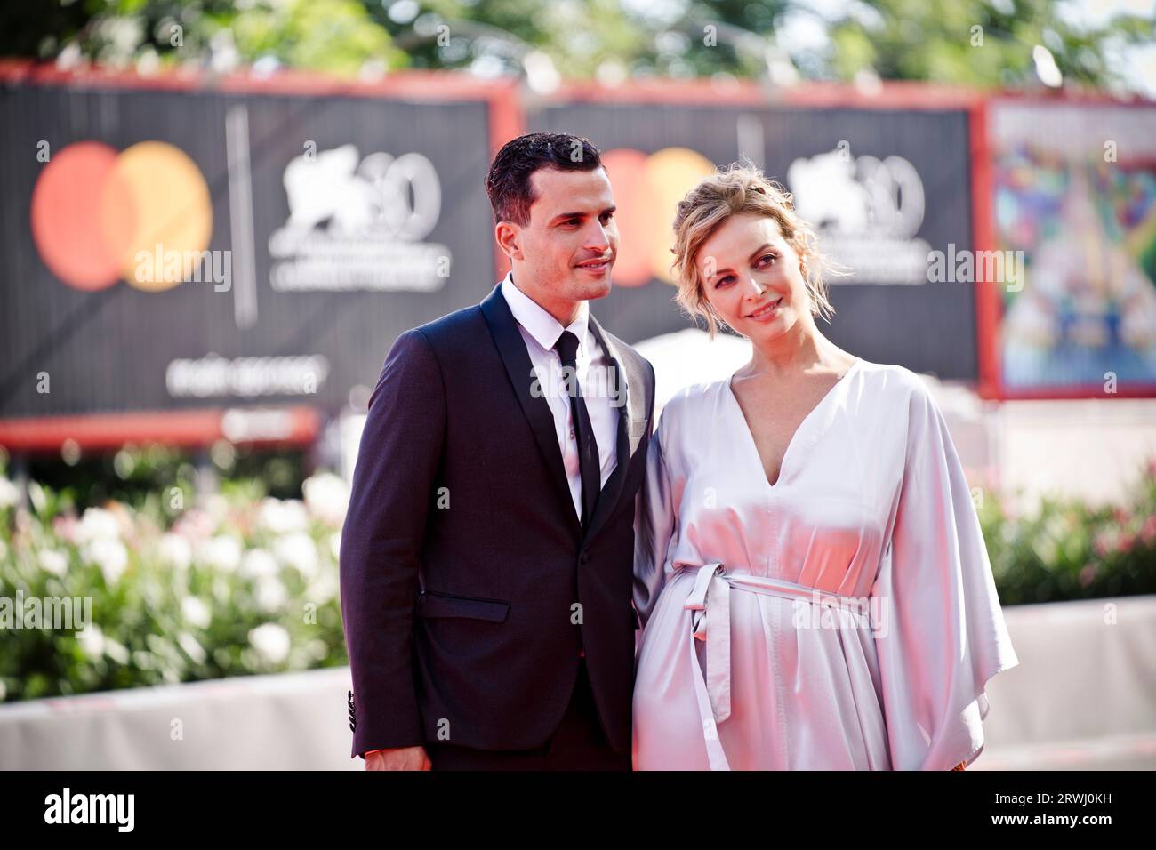 VENICE, ITALY - SEPTEMBER 06:  Violante Placido (R) and Brenno Placido attends a red carpet for the movie 'Io Capitano' at the 80th Venice Internation Stock Photo