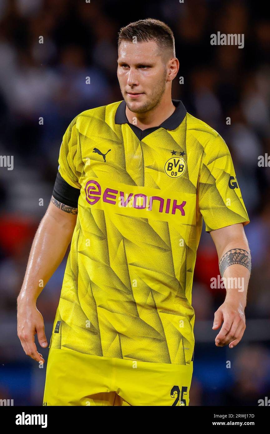 PARIS, FRANCE - SEPTEMBER 19: Niklas Suele (Borussia Dortmund) Looks On