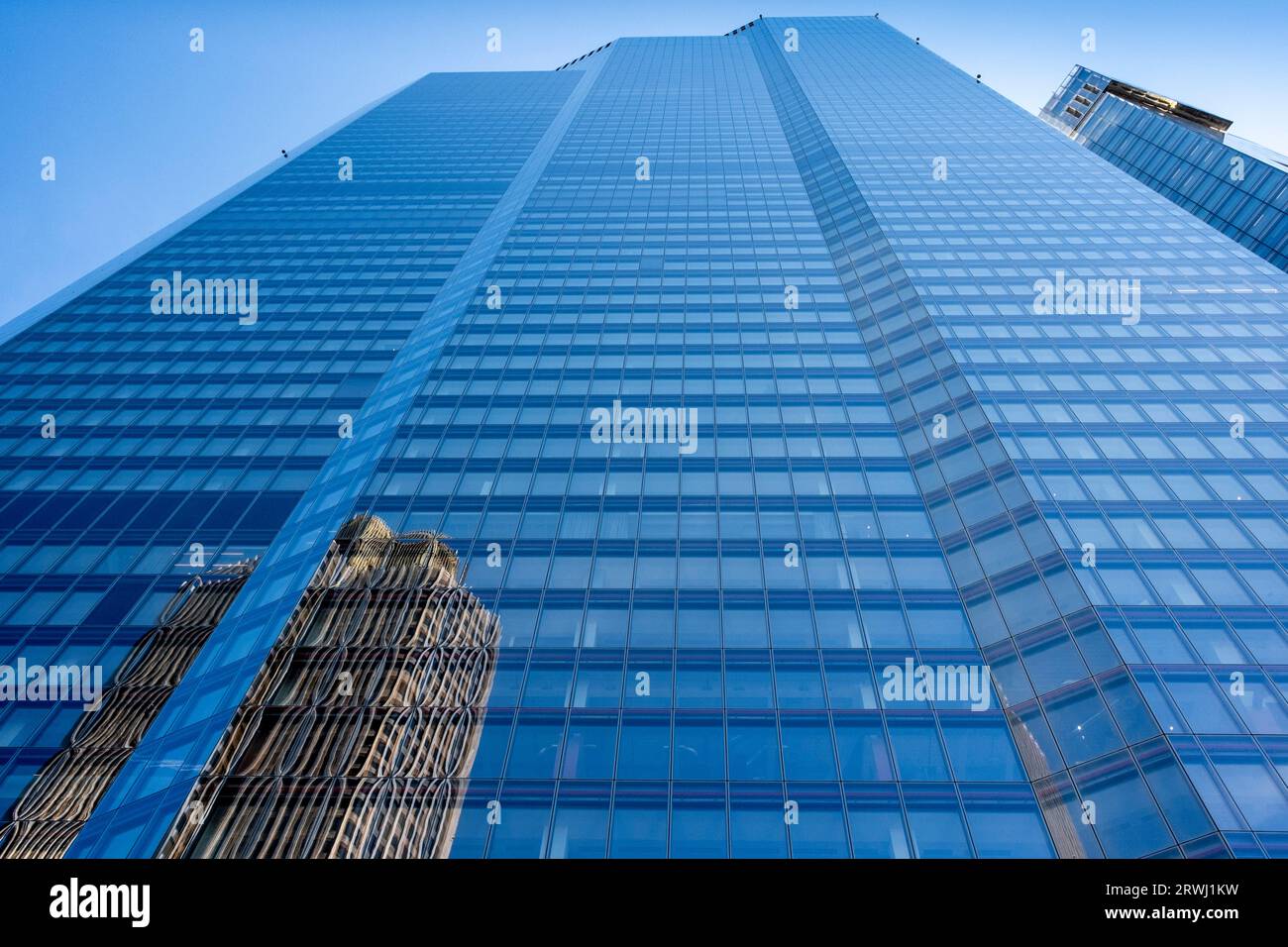 The 22 Bishopsgate Building with a Reflection Of The Nearby Tower 42, City of London, London, UK. Stock Photo