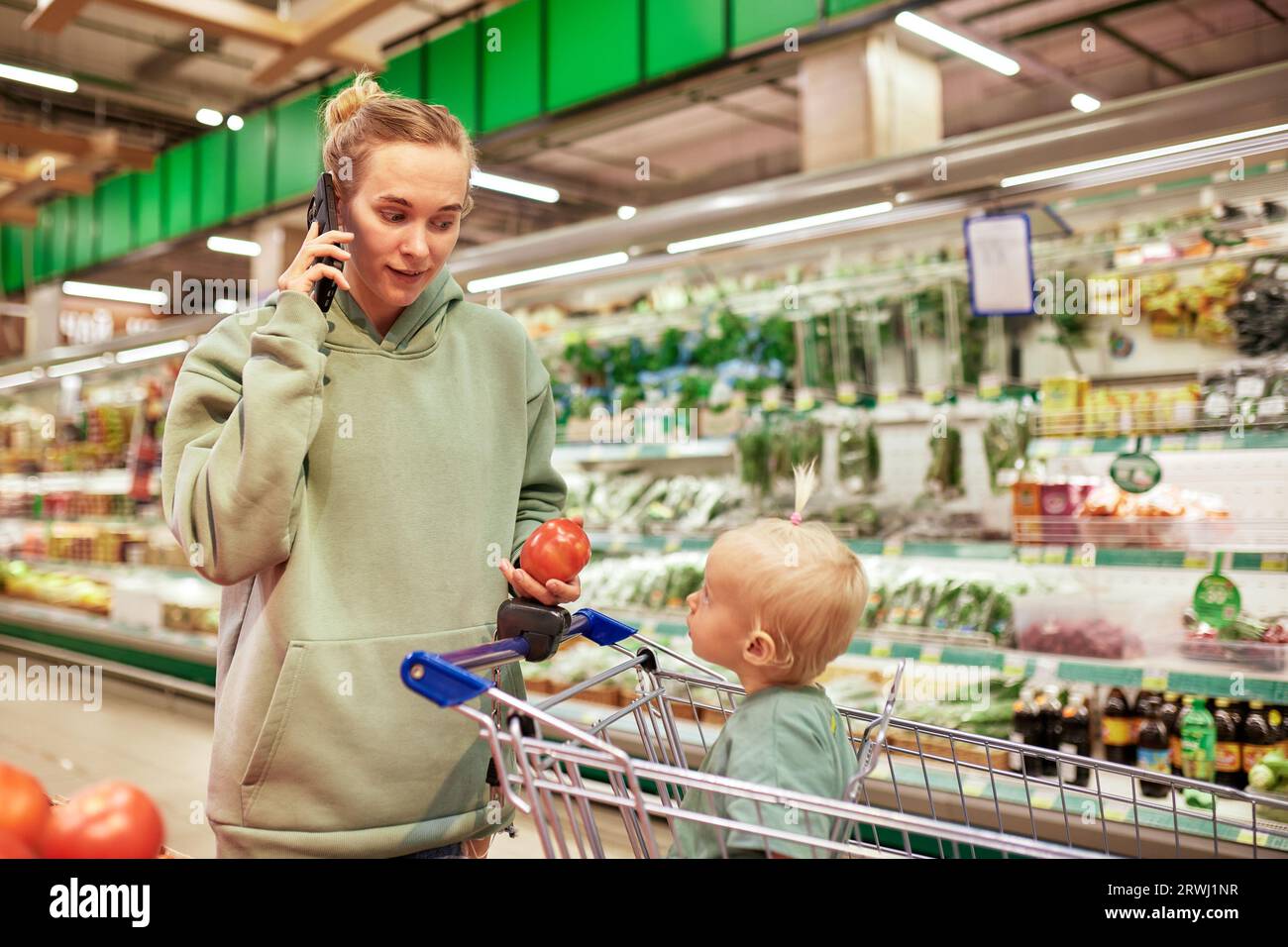 Budva, Montenegro - 17 march 2021: A child with a small trolley in the  supermarket, go shopping with his mother. The family goes shopping Stock  Photo - Alamy