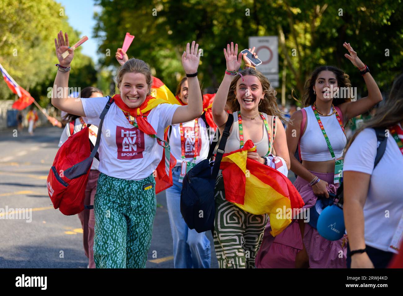 Pilgrims on their way to the opening Holy Mass in Parque Eduardo VII on the first day of World Youth Days 2023 in Lisbon, Portugal. Stock Photo