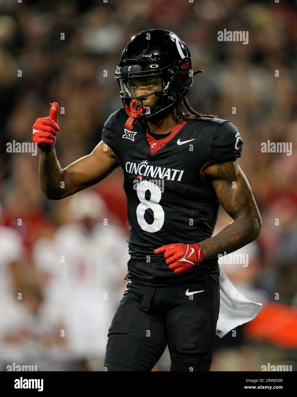 Cincinnati wide receiver Xzavier Henderson (8) gestures during an