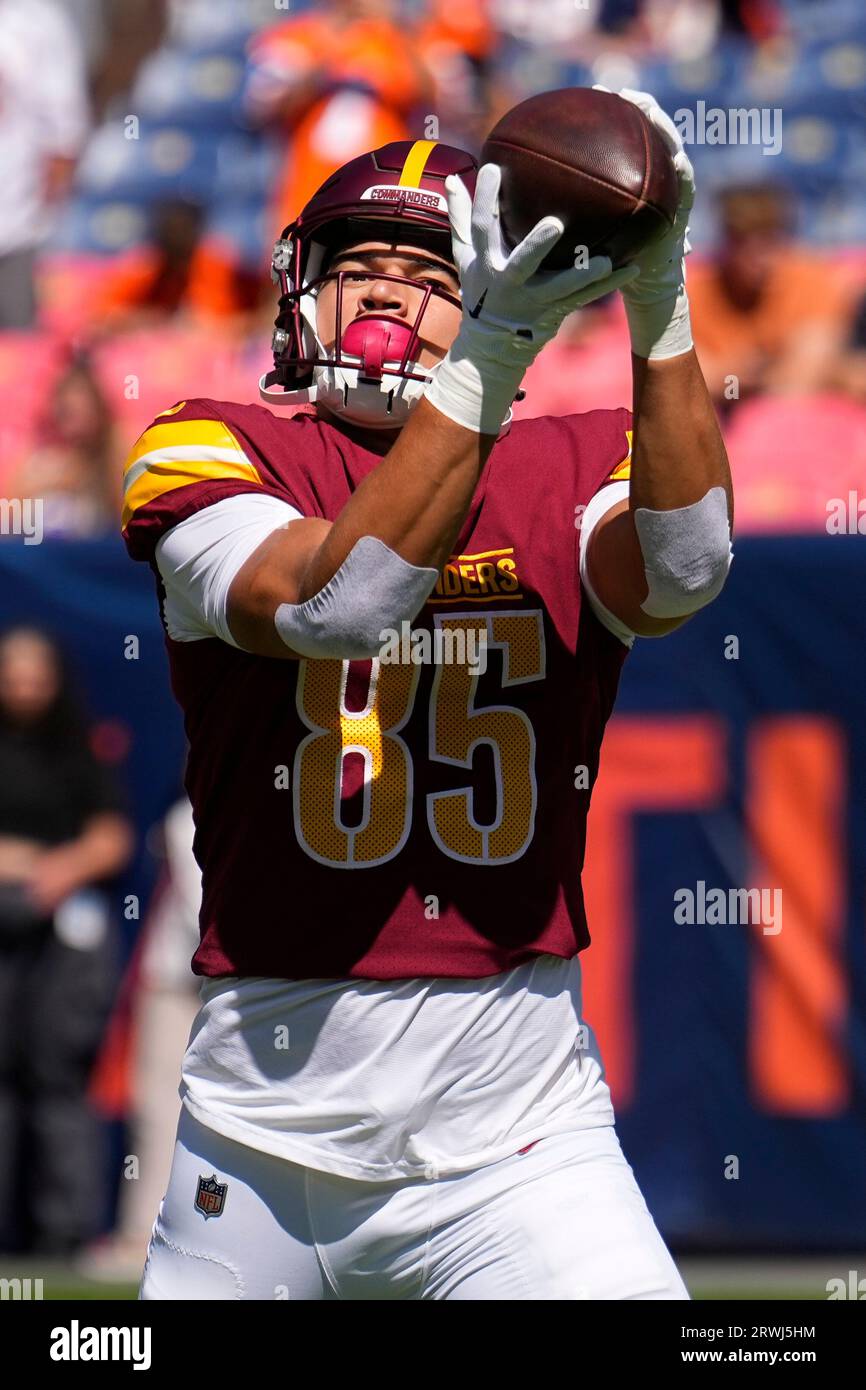 Washington Commanders tight end Cole Turner (85) warms up against the  Denver Broncos during an NFL football game Sunday, Sept. 10, 2023, in  Denver. (AP Photo/Jack Dempsey Stock Photo - Alamy