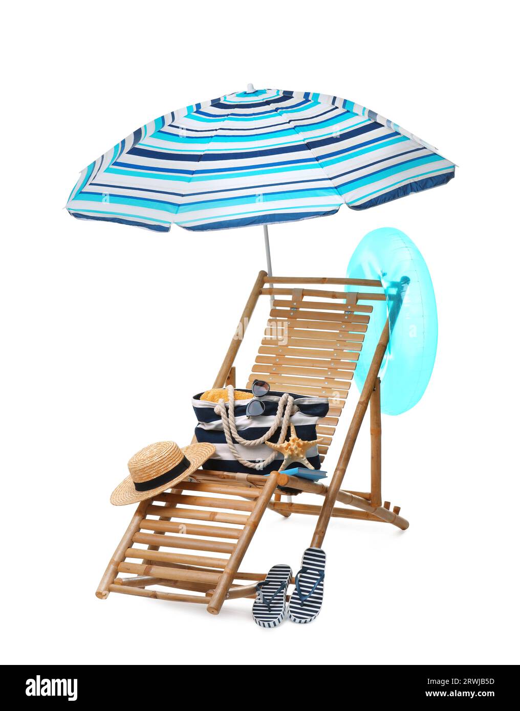 Deck chair, umbrella and other beach accessories isolated on white ...
