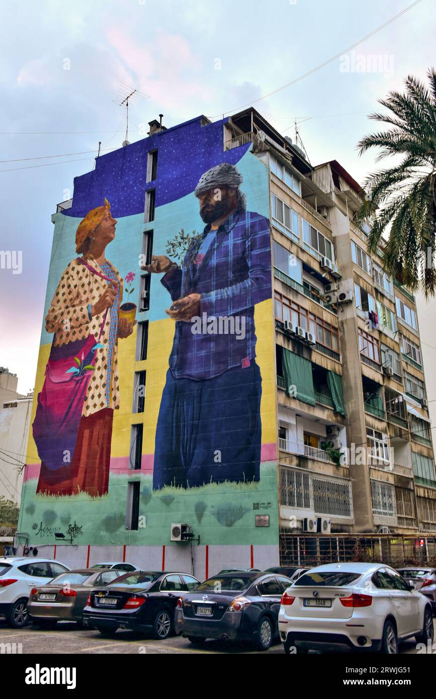 giant mural painting on the outer wall of a building in Hamra, Ras