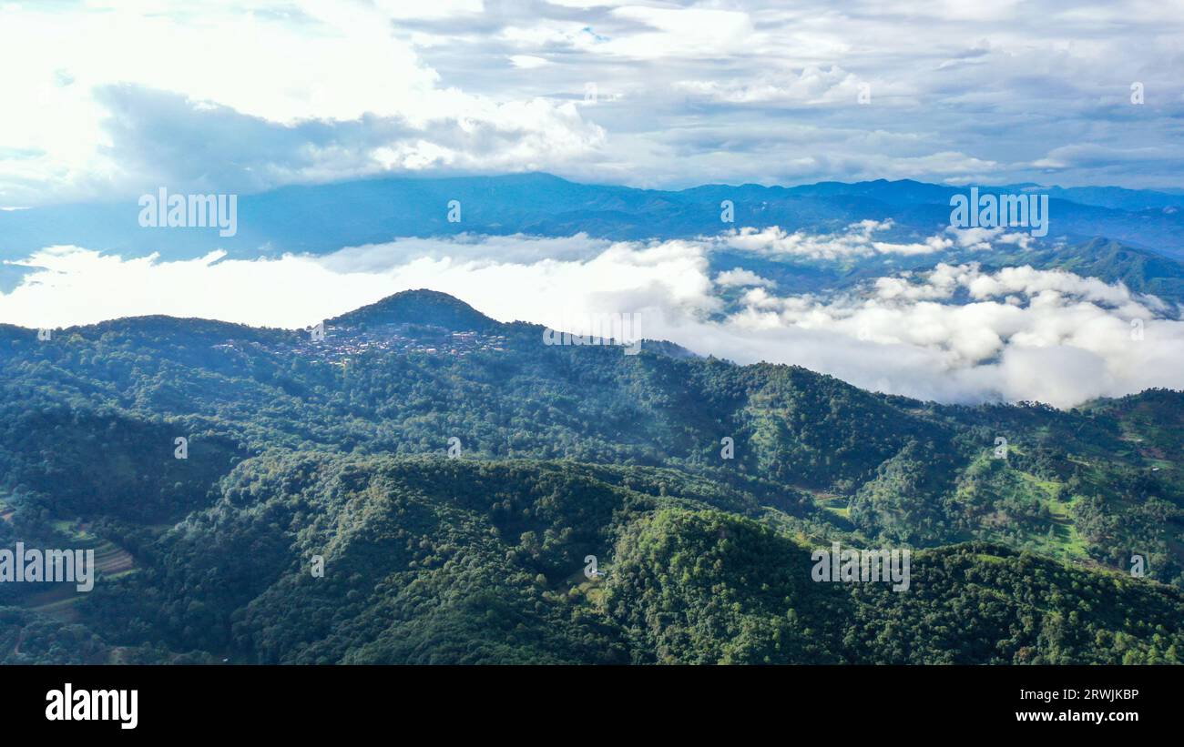 Pu'er. 17th Sep, 2023. This aerial photo taken on Sept. 17, 2023 shows the Jingmai Mountain in Pu'er City, southwest China's Yunnan Province. The Cultural Landscape of Old Tea Forests of Jingmai Mountain in Pu'er was inscribed on the UNESCO World Heritage List on Sunday at the extended 45th session of the UNESCO World Heritage Committee in Riyadh, Saudi Arabia, making it China's 57th World Heritage Site. Credit: Tang Rufeng/Xinhua/Alamy Live News Stock Photo