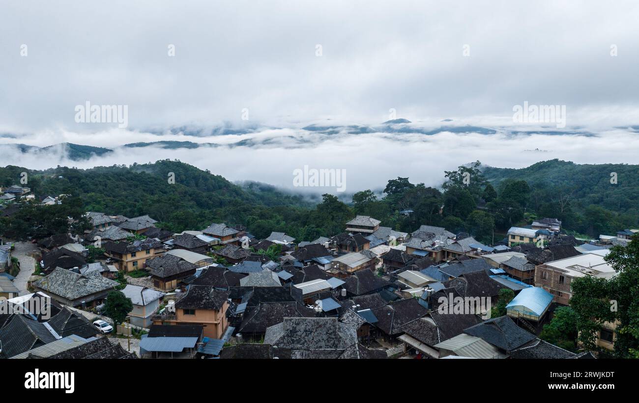 Pu'er. 19th Sep, 2023. This aerial photo taken on Sept. 19, 2023 shows the Manghong Village in Pu'er City, southwest China's Yunnan Province. The Cultural Landscape of Old Tea Forests of Jingmai Mountain in Pu'er was inscribed on the UNESCO World Heritage List on Sunday at the extended 45th session of the UNESCO World Heritage Committee in Riyadh, Saudi Arabia, making it China's 57th World Heritage Site. Credit: Hu Chao/Xinhua/Alamy Live News Stock Photo