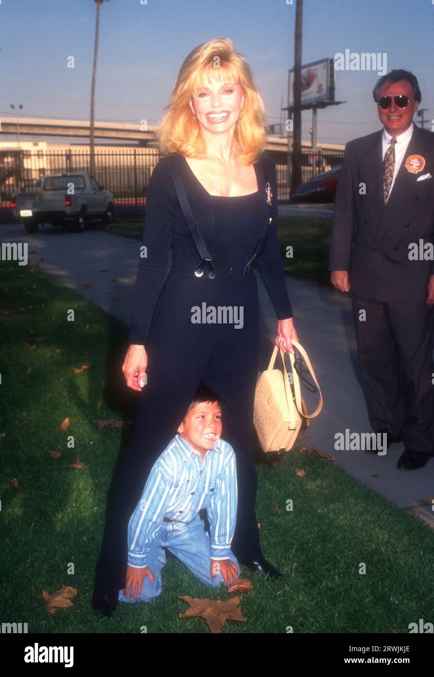 Los Angeles, California, USA 25th July 1996 Actress Loni Anderson and son Quinton Reynolds attend ÒThe Greatest Show On EarthÓ Ringling Brothers and Barnum & Bailey 126th Edition to Benefit the Variety Club ChildrenÕs Charity at the Los Angeles Sports Arena on July 25, 1996 in Los Angeles, California, USA. Photo by Barry King/Alamy Stock Photo Stock Photo