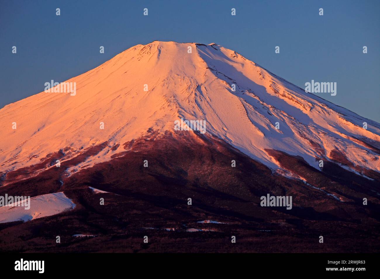 Fuji in the morning glow from Yamanakako Stock Photo