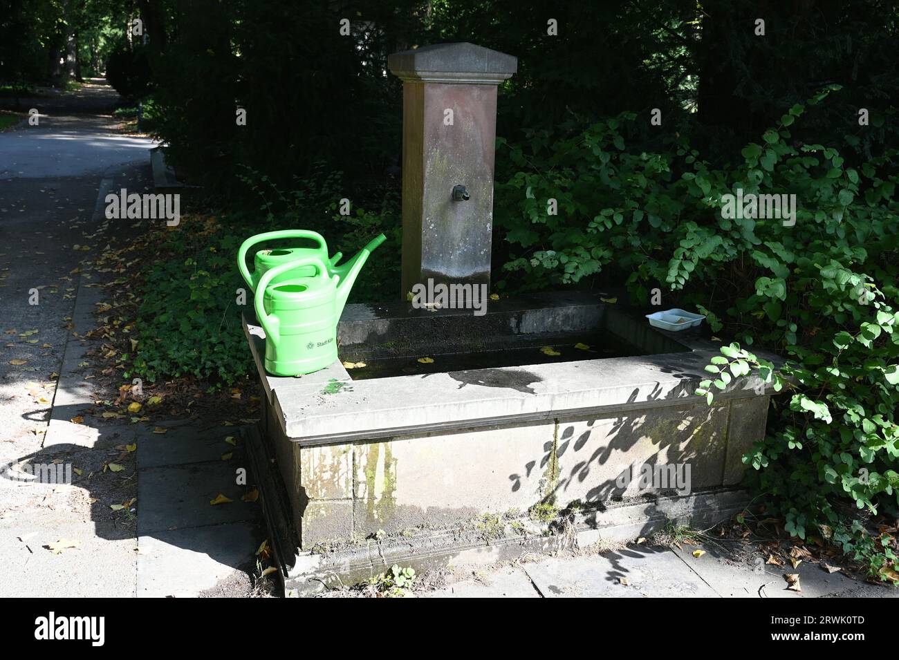 Cologne, Germany. 10th Sep, 2023. Fountain with watering cans at the Cologne celebrity cemetery Melaten Credit: Horst Galuschka/dpa/Horst Galuschka dpa/Alamy Live News Stock Photo