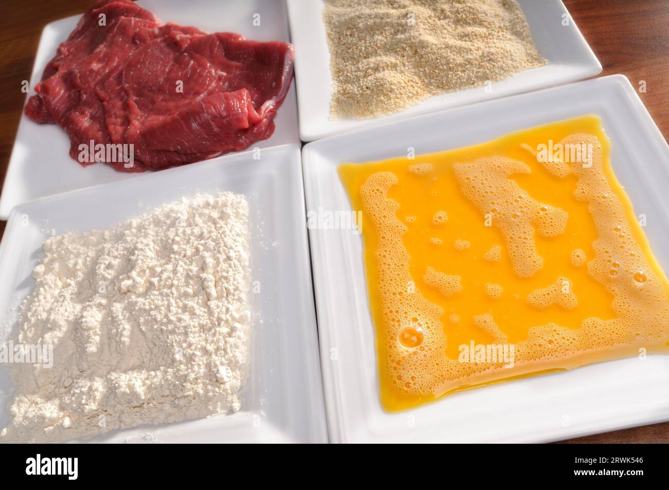 Schnitzel breading ingredients Stock Photo Alamy