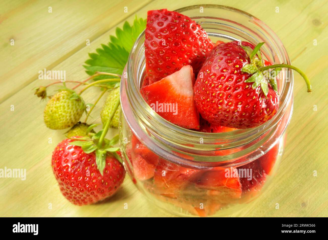 Fresh strawberries in a jar Stock Photo - Alamy