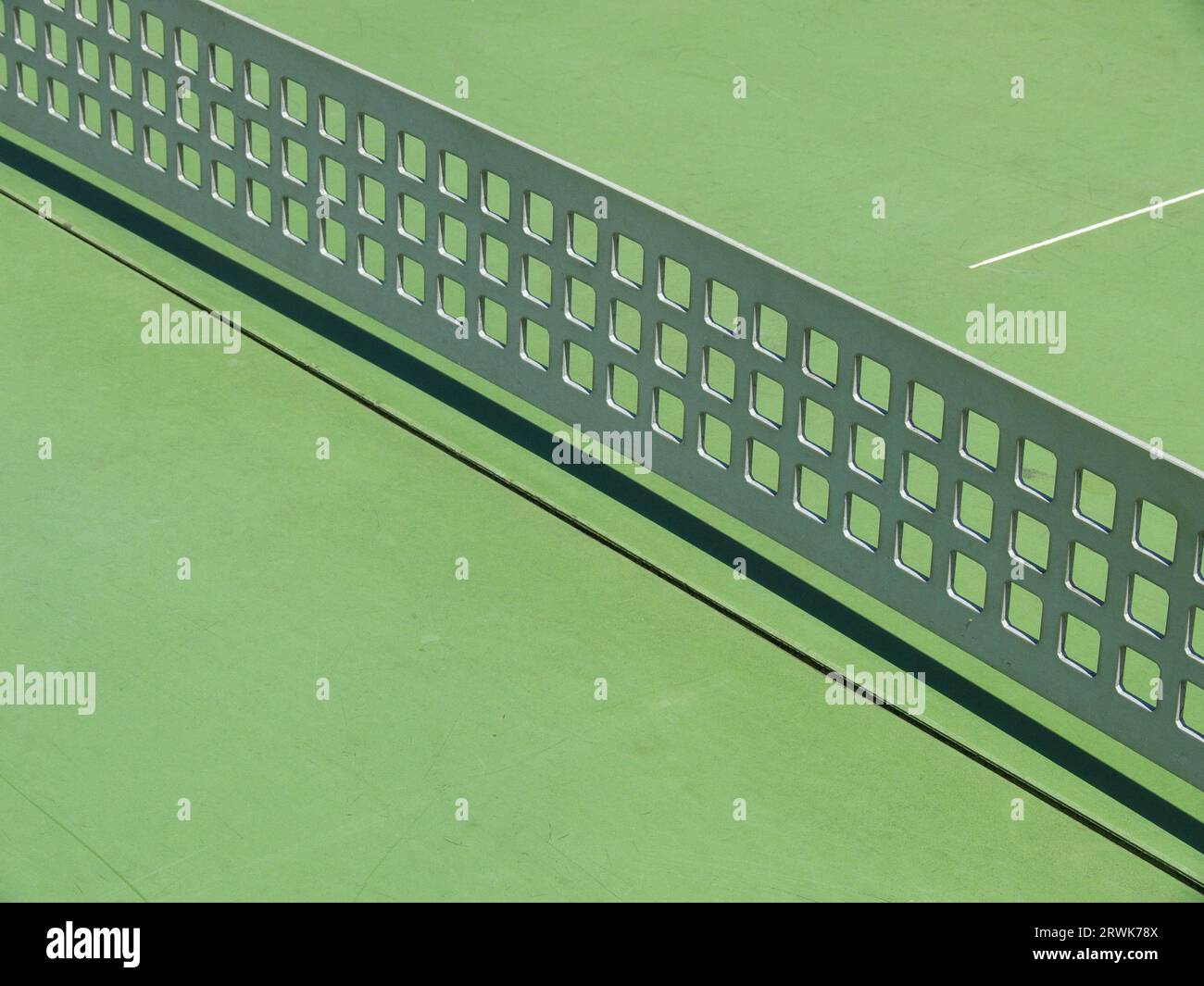 Green table tennis table with metal divider, cutout Stock Photo Alamy