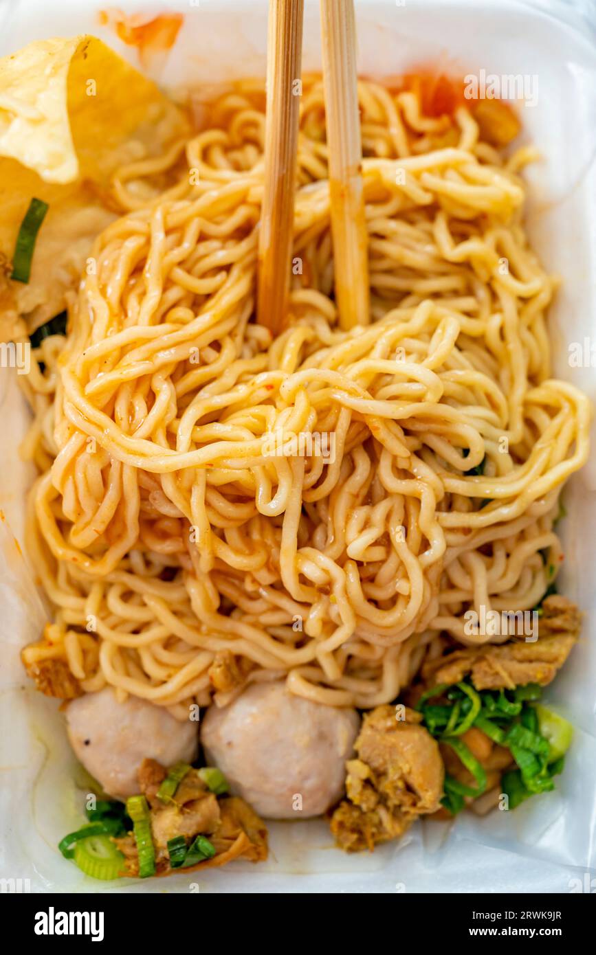Close-up view of chicken noodles (mie ayam). Traditional Indonesia food