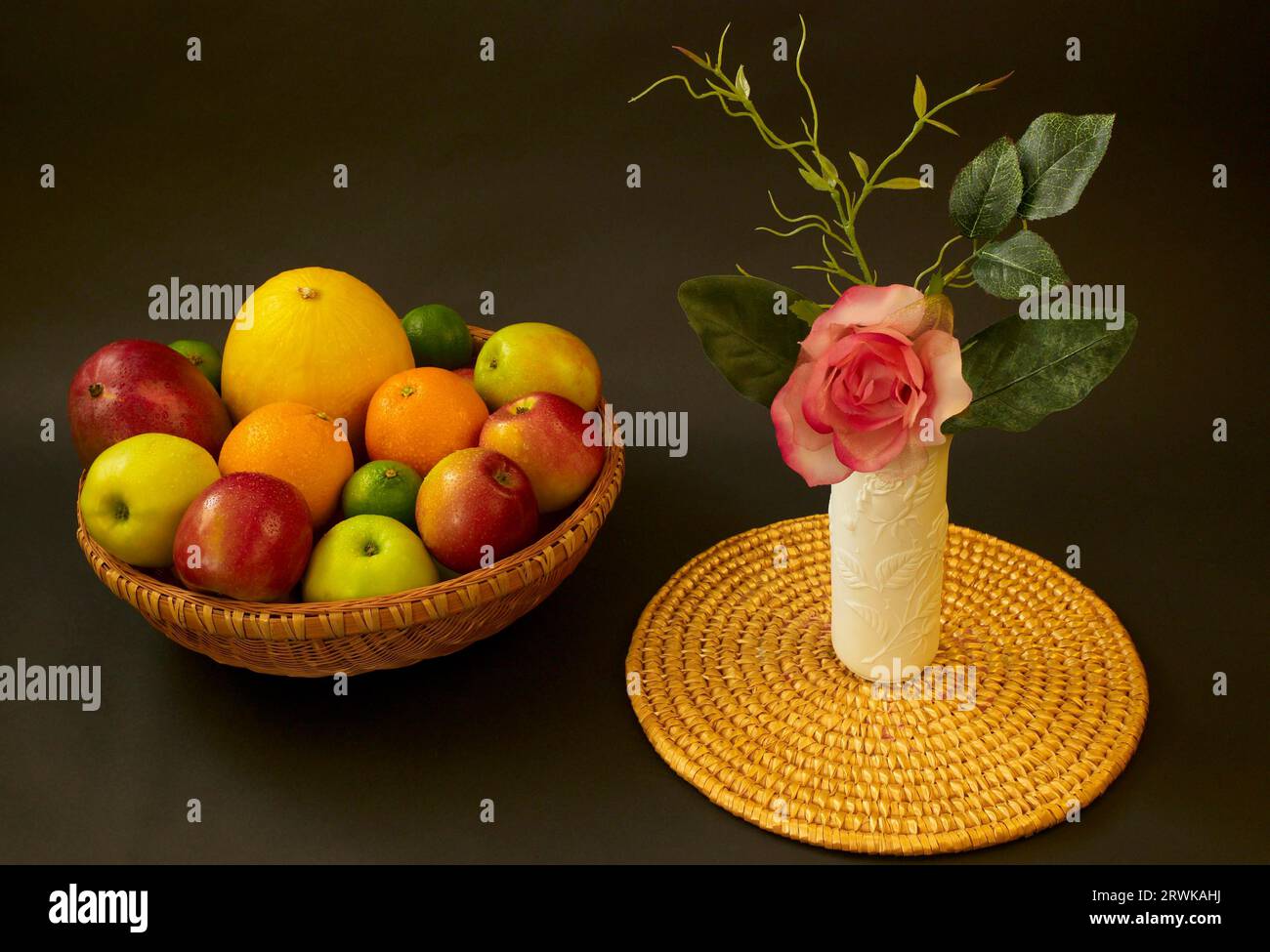 Fruit Bowl with Vase and Rose Stock Photo