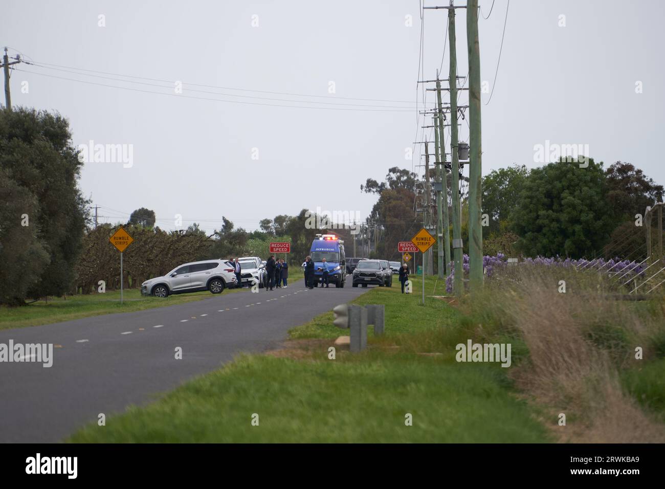 Turnbull Rd Ardmona Victoria Australia 20th September 2023. A Cluster of police cars marked and unmarked outside the premises where armed fugitive Stanley Turvey was shot dead. Credit PjHickox/Alamy LIve News Stock Photo