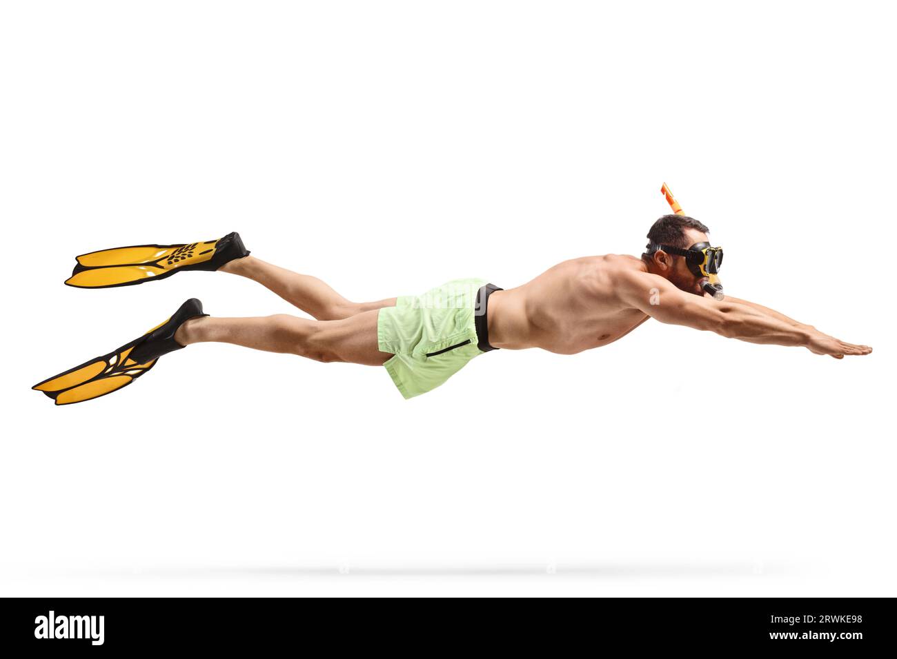 Man swimming with a snorkeling mask and fins isolated on white ...