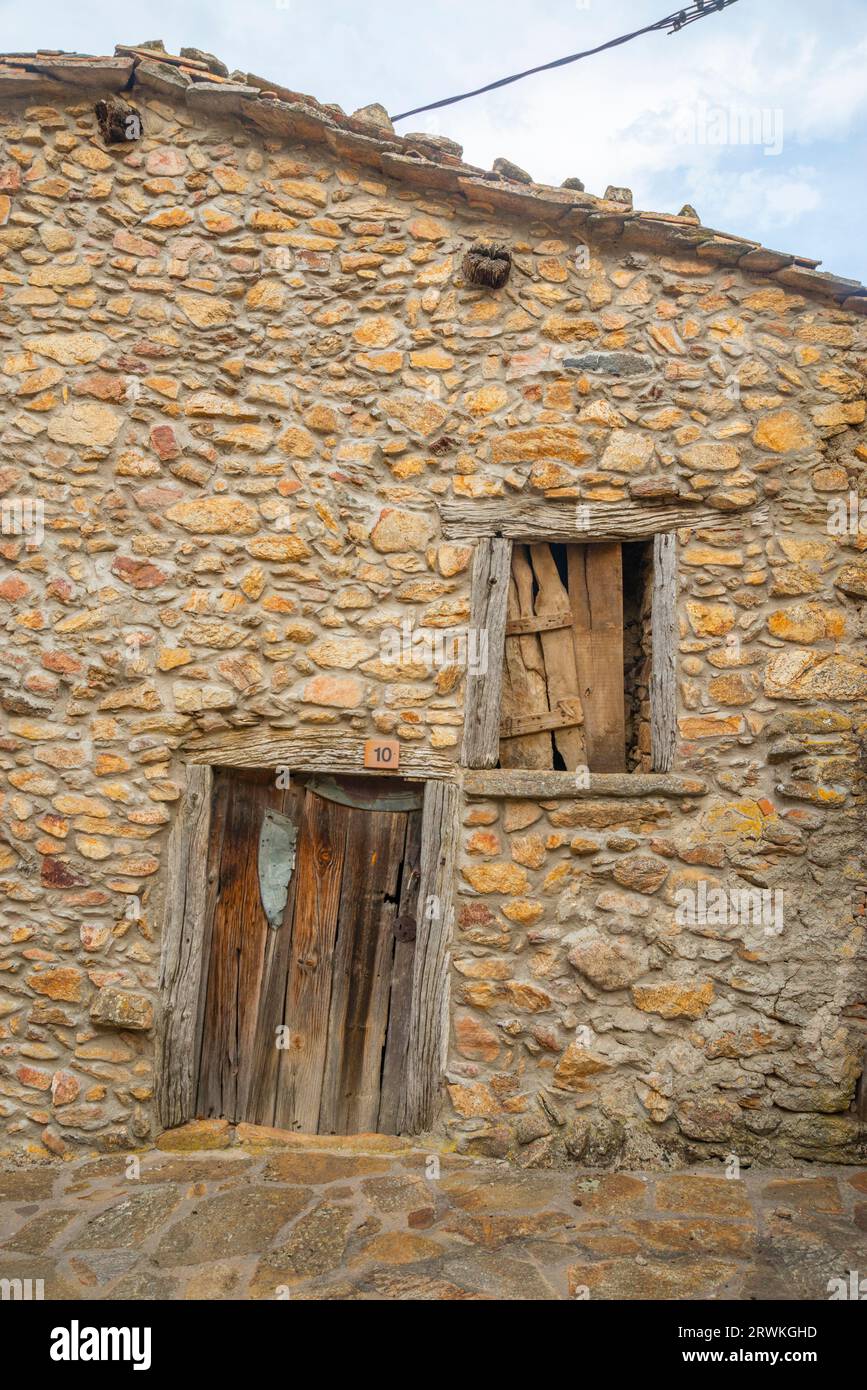 Facade of house in ruins. Piñuecar, Madrid province, Spain. Stock Photo
