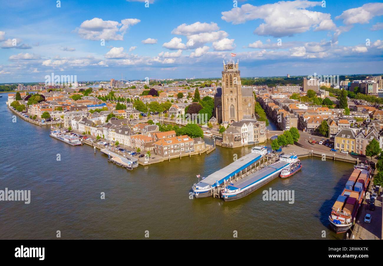 Dordrecht Netherlands, the skyline of the old city of Dordrecht with church and canal buildings in the Netherlands oude Maas river Stock Photo