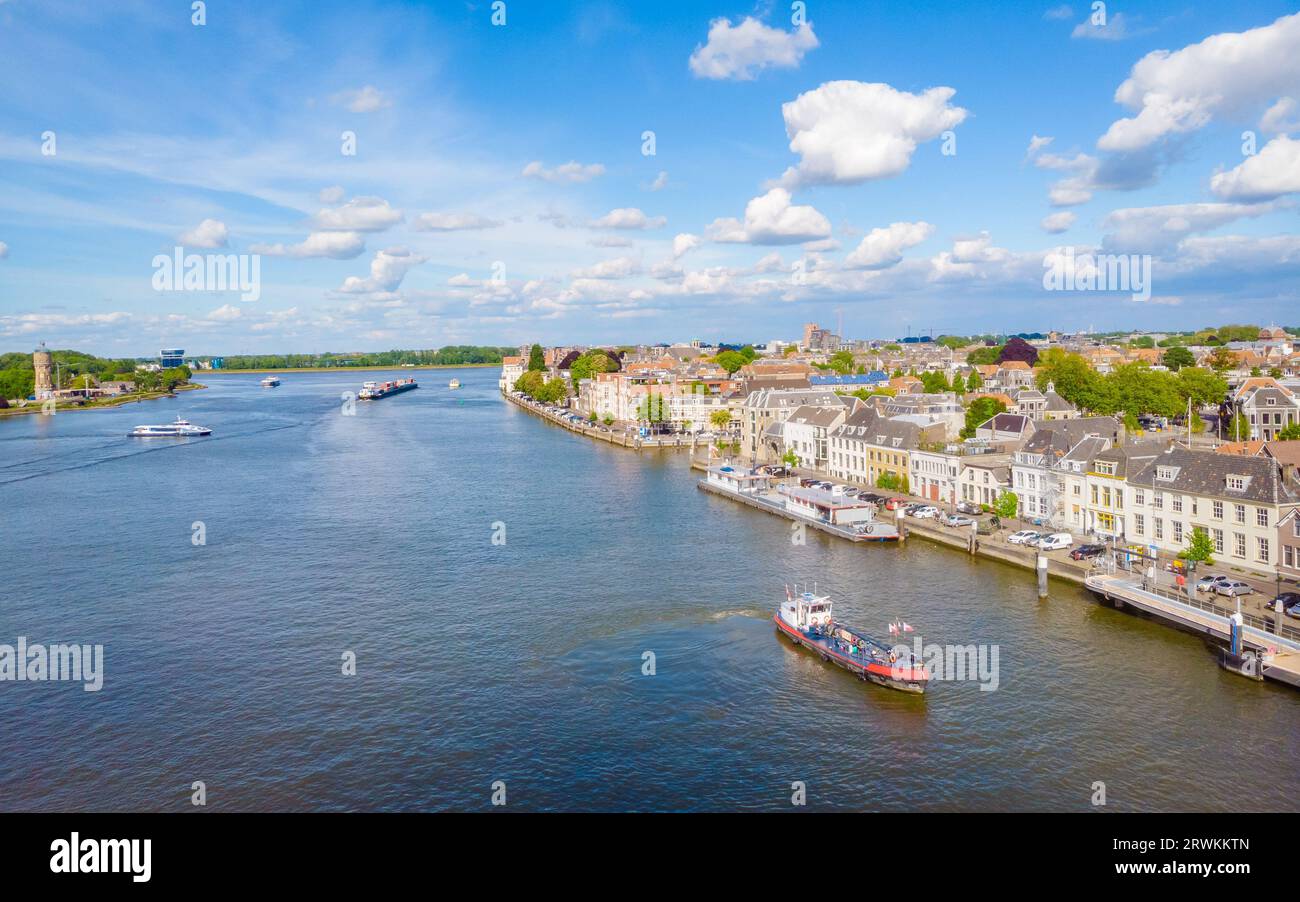 Dordrecht Netherlands, the skyline of the old city of Dordrecht with church and canal buildings in the Netherlands oude Maas river Stock Photo