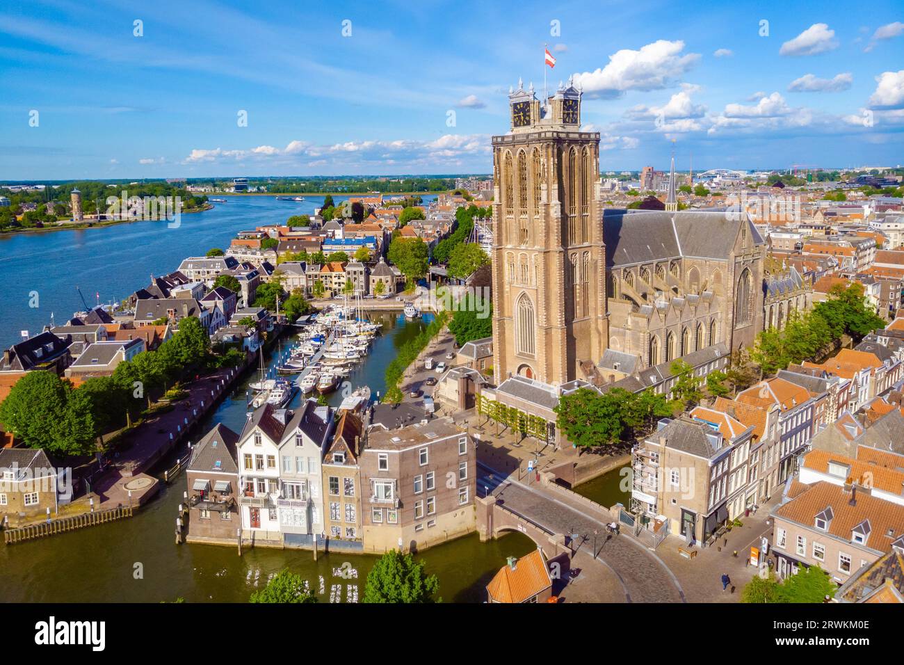 Dordrecht Netherlands, the skyline of the old city of Dordrecht with church and canal buildings in the Netherlands oude Maas river Stock Photo