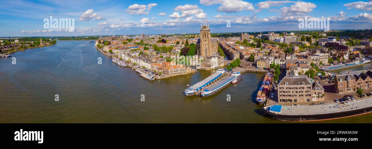 Dordrecht Netherlands, the skyline of the old city of Dordrecht with church and canal buildings in the Netherlands oude Maas river Stock Photo