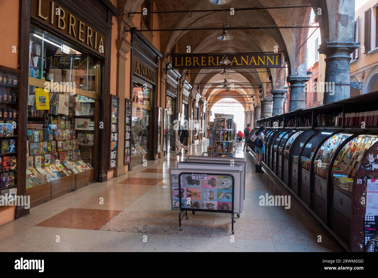 Libreria Nanni Bookshop and a restaurant on Via de' Musei, covered with long high-ceiling porticos or colonnades with a roof structure over a walkway Stock Photo