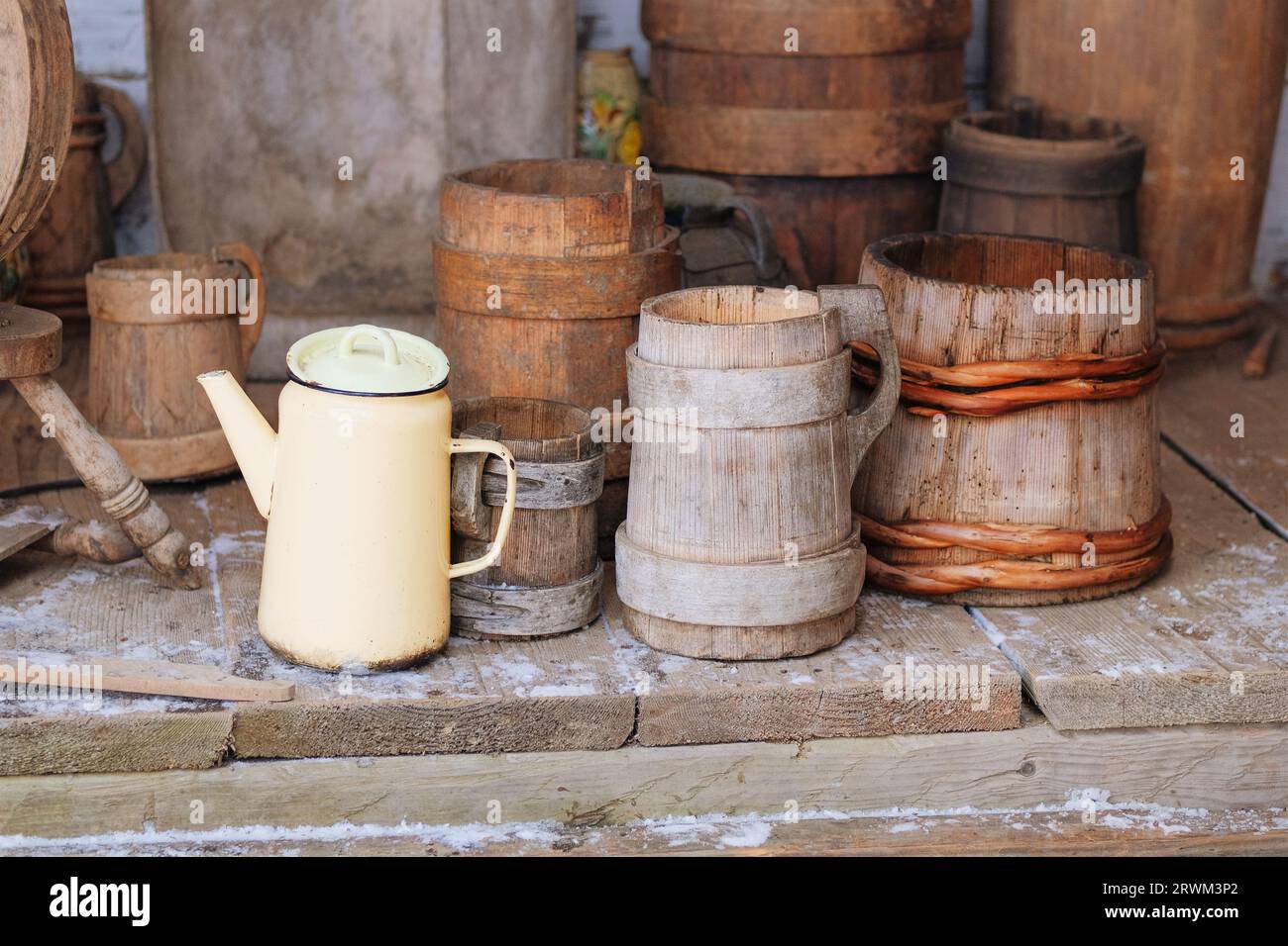 Wooden traditional pot in vintage style. Ukrainian cultural national style. Installation in museums of traditional rural household items. Stock Photo