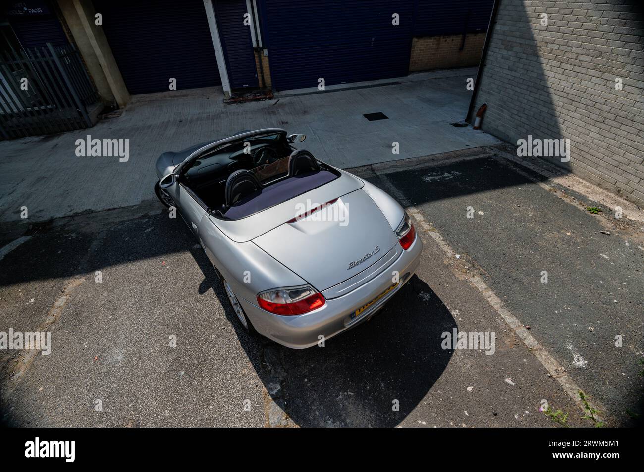 Boxter Rear Rear view of a Porsche Boxter parked in an urban compound Stock Photo ...