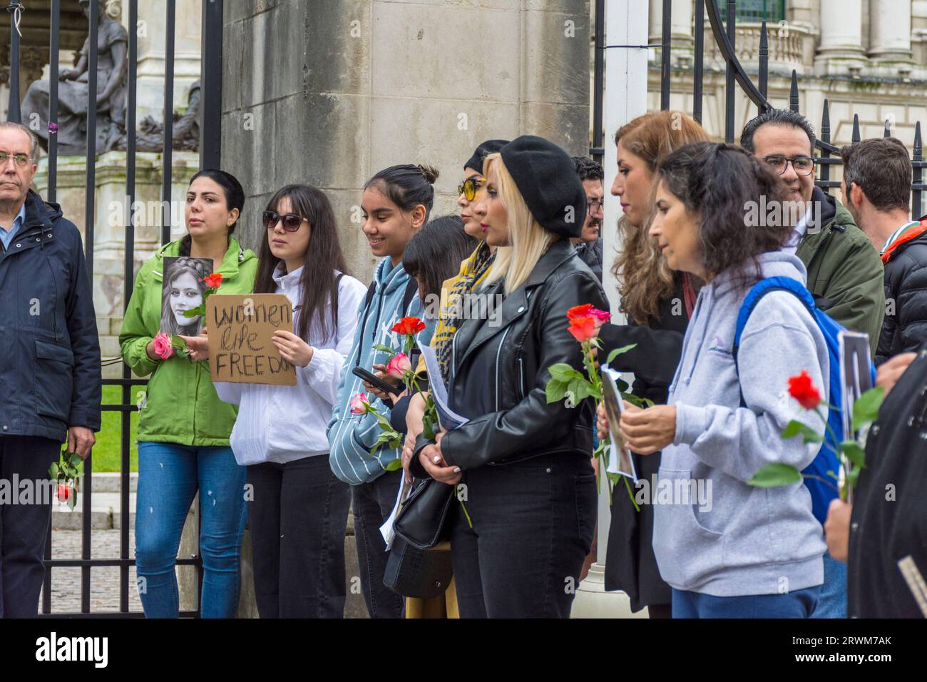Vigil on the anniversary of Mahsa Amini, the Kurdish woman who died in police custody for not wearing the hijab correctly in Iran. Belfast city hall, Northern Ireland Stock Photo