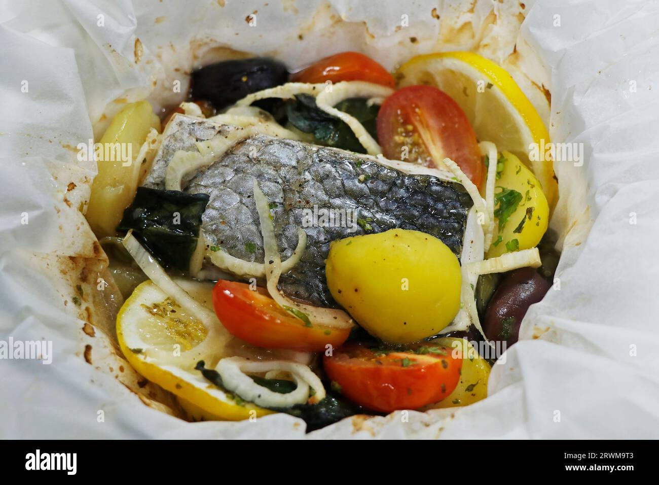 mediterranean cuisine sea bass papillote Stock Photo Alamy