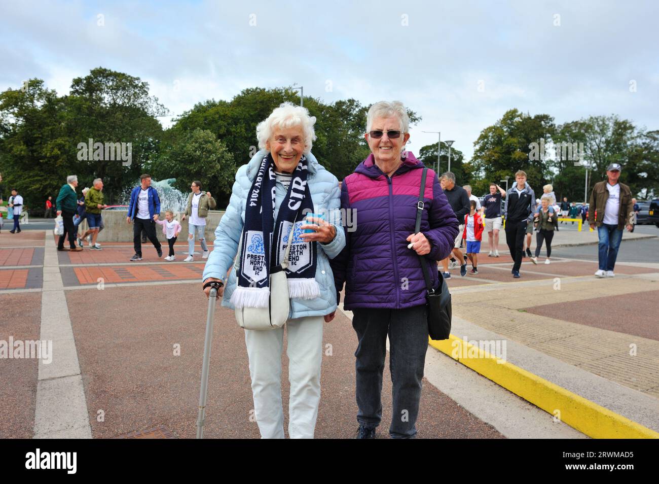 A lady PNE fan with her elderly mother at a match. Stock Photo