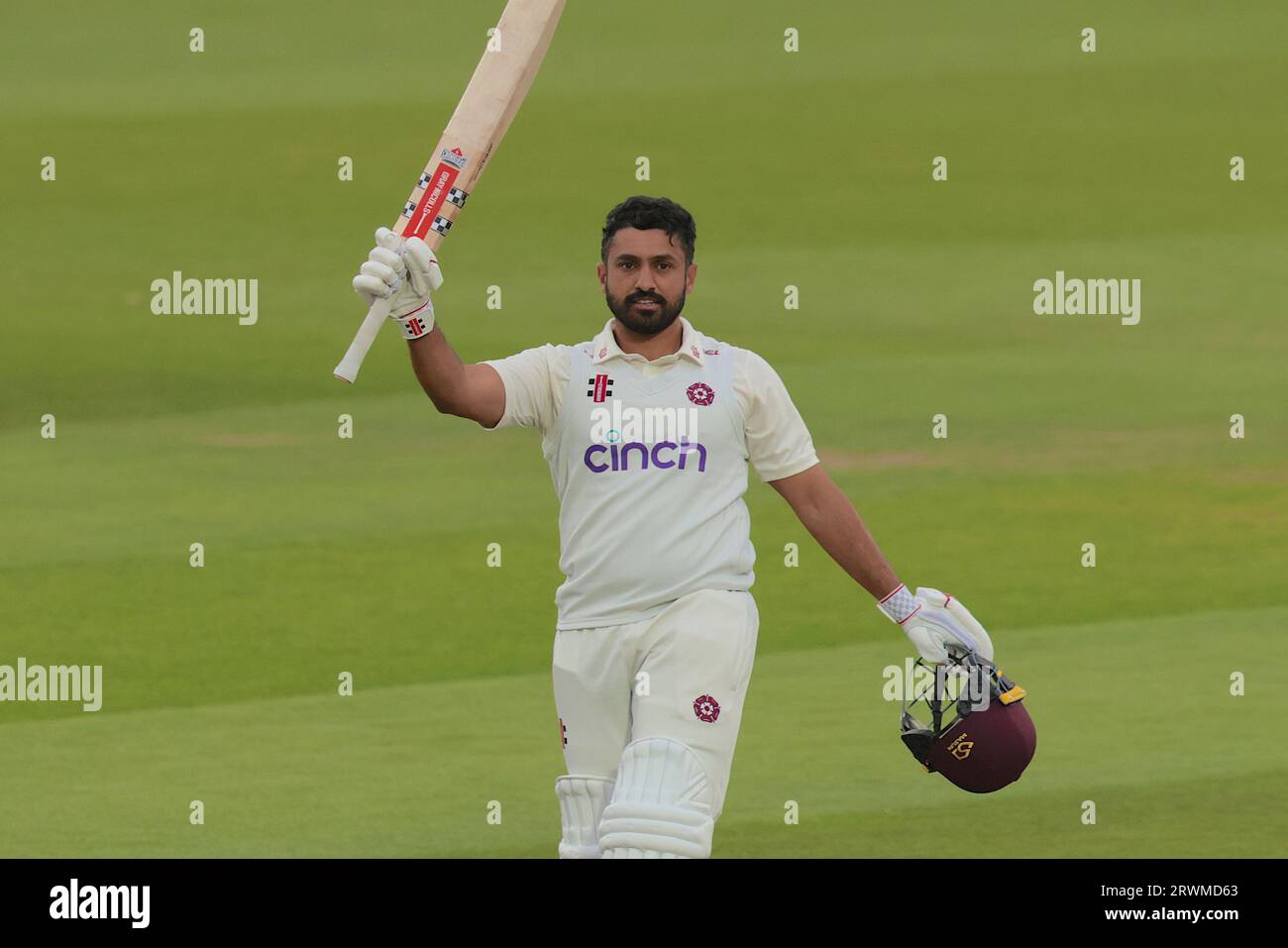 London, UK. 20th Sep, 2023. Northamptonshire's Karun Nair celebrates with a raised bat after reaching his 100 as Surrey take on Northamptonshire in the County Championship at the Kia Oval, day two. Credit: David Rowe/Alamy Live News Stock Photo