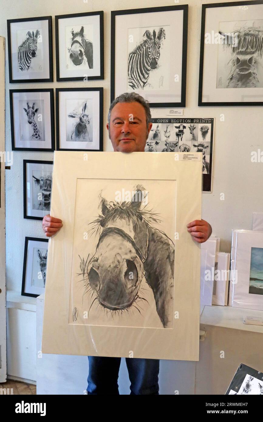 Paul Robinson artist, with horse in his studio gallery at 7 Horsemarket, Barnard Castle, County Durham, England, UK, DL12 8LY Stock Photo