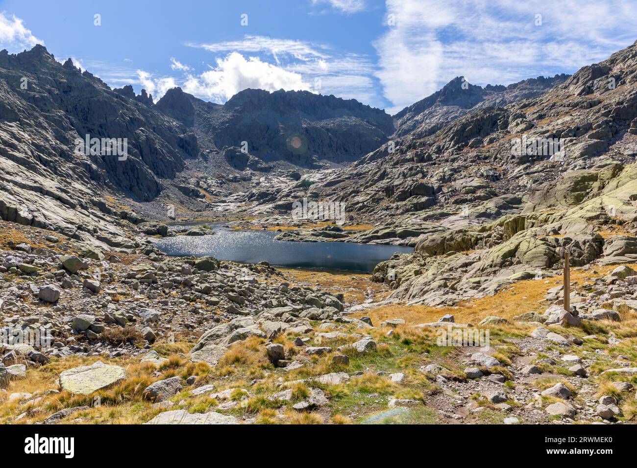 Laguna Grande de Gredos in Sierra de Gredos, landscape with high rocky mountains in the background, autumn view. Stock Photo