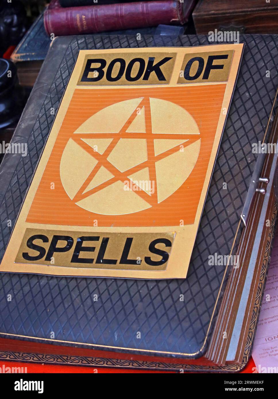 Traditional occult book of spells, available for sale in a shop, in Barnard Castle, Teesdale, Co Durham, England, UK, DL12 8PH Stock Photo